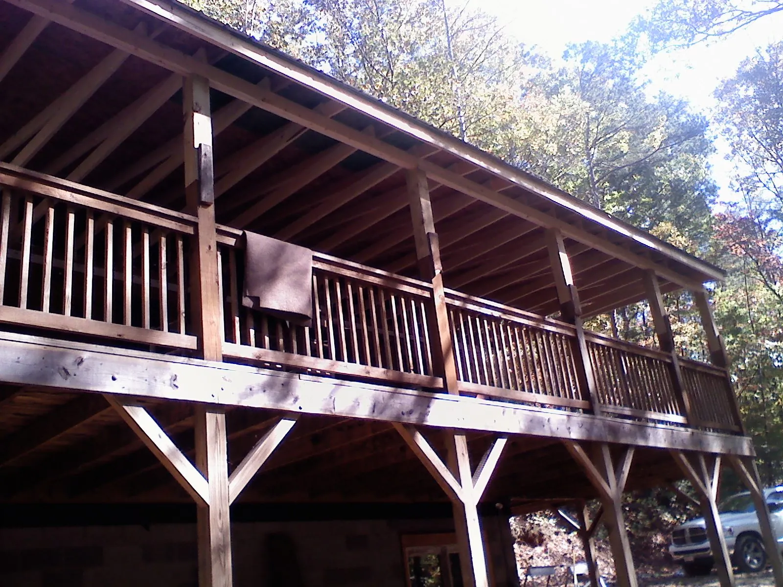 Timber framing under a new elevated porch and deck — Roof Leak Repair in Collierville by Roofing Brothers